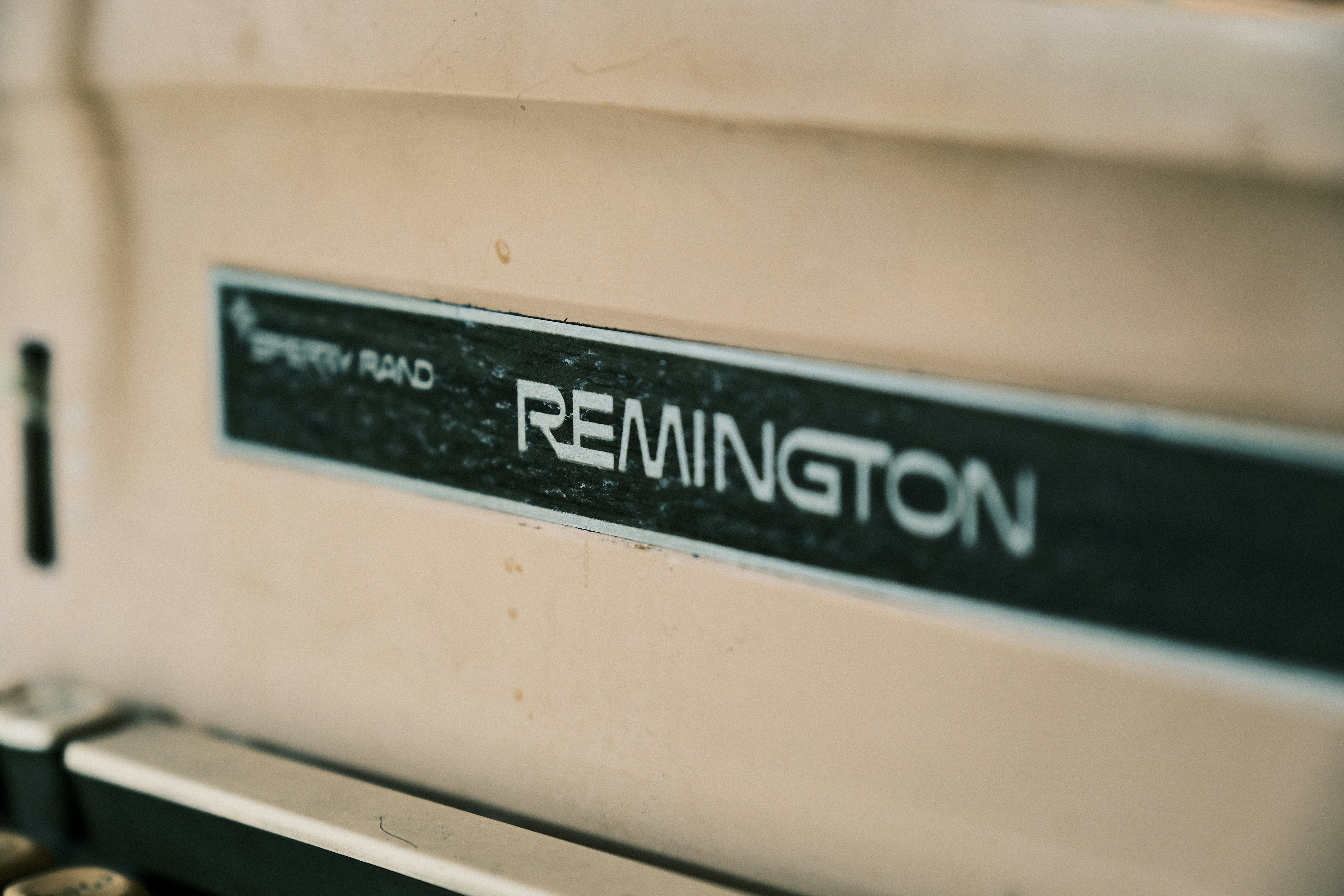 ❓ FAQ: Your Burning Questions About Customized AI Benchmarks Answered by ChatBench.org a close up of a typewriter with the words remington on it